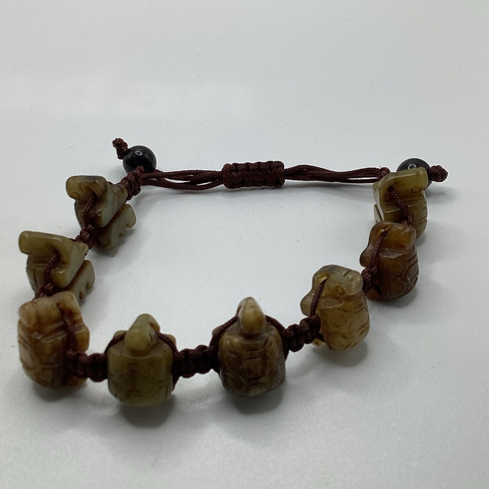 Brown Macrame Corded Bracelet with Carved Turtle Figures